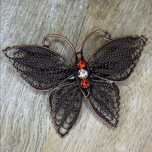 Copper filigree style butterfly brooch